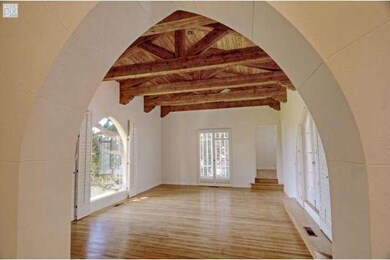 Exposed wood ceiling and open beams, hardwood floo