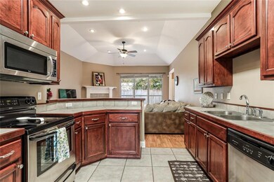 pretty kitchen with stainless steal appliances