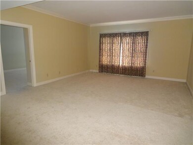 Big living room with master bedroom beyond.