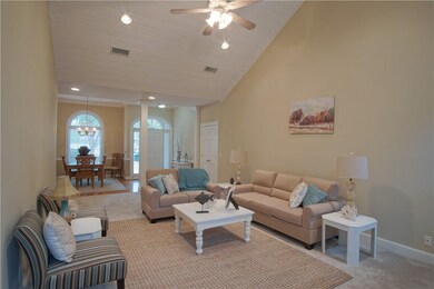 Great Room has vaulted ceiling with fireplace