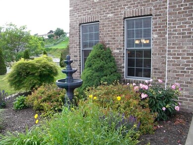 Inviting landscaping bed to the left of the front 