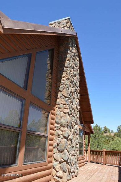 BEAUTIFUL ROCK FIREPLACE  WITH WRAP AROU