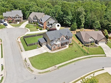 Aerial perspective of suburban area with a forest