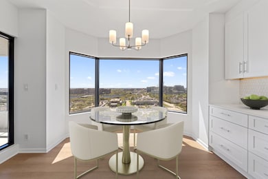 Dining area shown virtually staged.