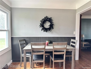 Dining space with wood finished floors