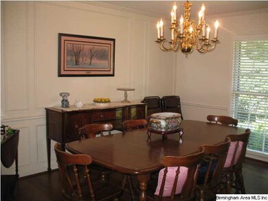 Large formal living room with masonary fireplace t