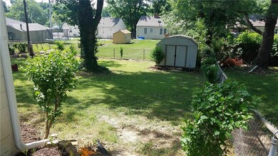 Fenced Backyard with storage shed
