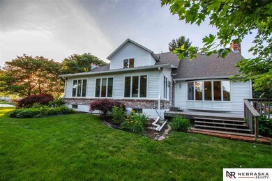 The deck is accessible from the both the family room off the kitchen and the sun room.