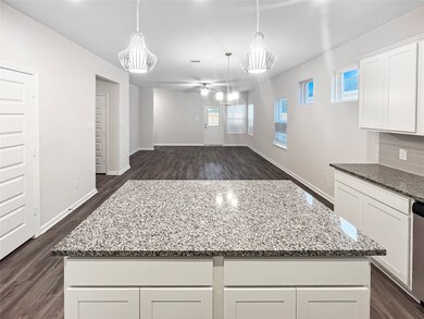 The Kettering II-Kitchen into the Family Room. Hom