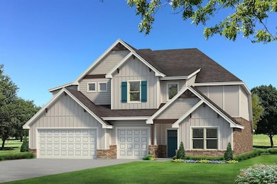 Craftsman-style home featuring a garage and a fron