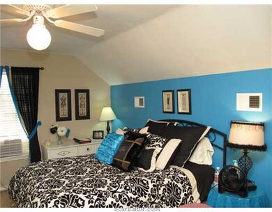 Bedroom. Bright, updated colors and raised ceiling