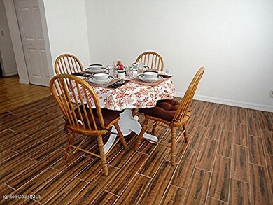Tiled formal dining room.