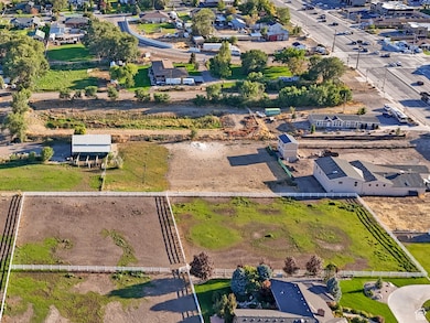 Aerial view of property's location with a mountain backdrop