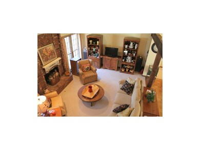 Family room with vaulted ceiling and beam detail