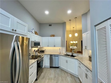 2671 Citrus Lake Dr unit 303, Naples, FL 34109 - photo 4