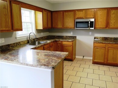 631 Pasadena Ave, Sheffield Lake, OH 44054 - photo 2