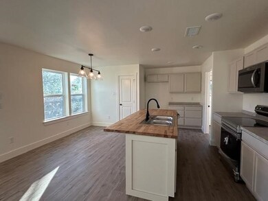 211 E Cardinal St, Ector, TX 75439 - photo 5