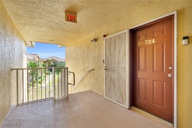 Entrance to property with a balcony