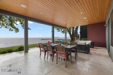 View of patio featuring outdoor dining area, a wat