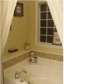 Garden tub in master.