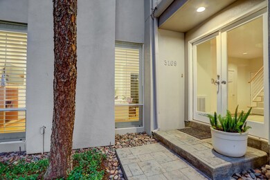 The wide double doors lead into a large entryway.
