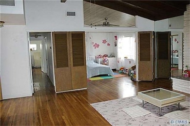 Living room and den/bedroom.  You can open the dou
