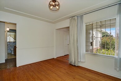 Dining Room opens to the Kitchen and to the hallwa