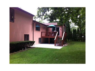 Exterior Back. Back of house, deck and patio in pr