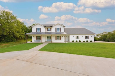 Welcome home to your modern farmhouse in Western Shawnee.  Sitting on top of a bluff overlooking the Kansas River this home is your private oasis from it all!