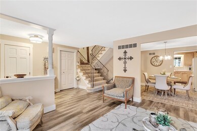 Updated luxury laminate floors, trim, paint, light