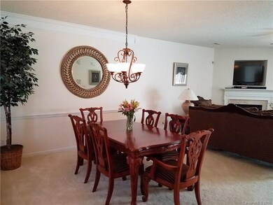 View from front door of dining open to family room