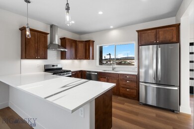 Photo of similar model; finishes are the same.