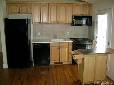 Kitchen - Maple cabinets, ceramic tile back splash