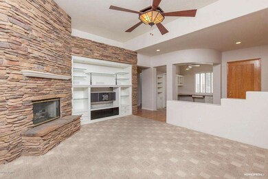 LIVING ROOM WITH VIEWS TO OFFICE/DEN