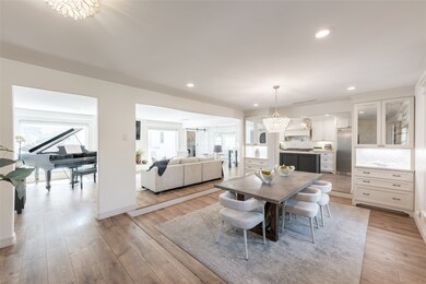 This large and bright, open-concept home features