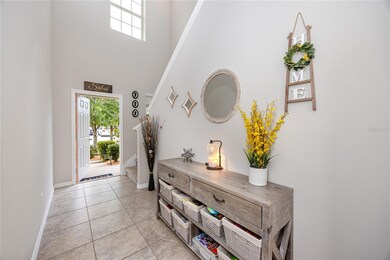 Foyer and Hallway at 7034 Emerald Spring Lp, New Port Richey, FL 34653 at Copperspring