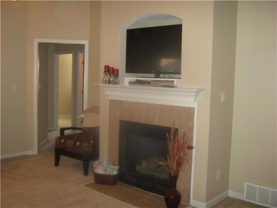 Living Room also has fireplace with gas logs