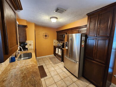 2426 Woodtown Dr, Houston, TX 77038 - photo 5