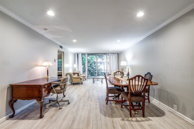 Crown-moulding throughout the living room space.