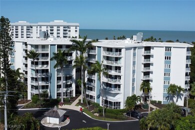 View of property with a water view