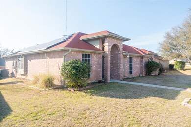 View of property exterior featuring roof mounted s