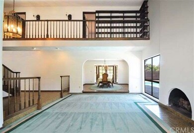 Spacious living room with soaring ceilings.