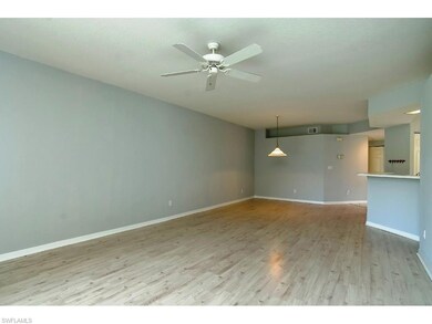 Plant ledges, neutral laminate wood floors and ang