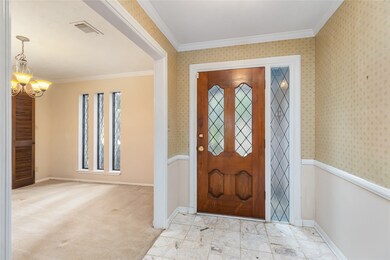 Front entry showing the formal dining room