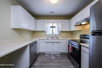 Kitchen w/ Stainless Steel Appliances