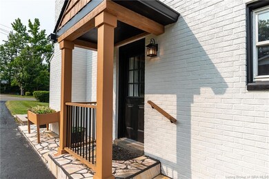 Nice side porch with tiger stone!
