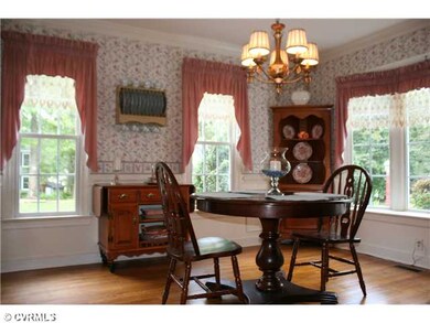 Dining Room - Hardwood Floors, Chair Rail, Window 