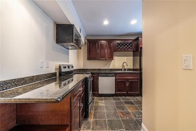 Kitchen with appliances with stainless steel finis