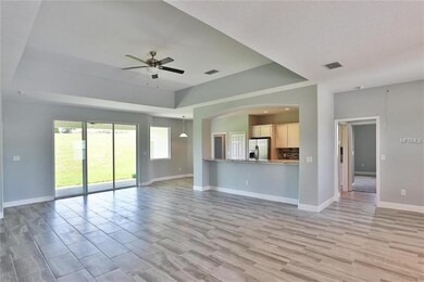OVERSIZED GLASS SLIDING DOORS LOCATED IN THE GREAT