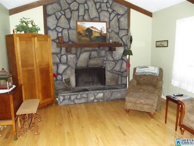 The great room has high vaulted ceilings that make
